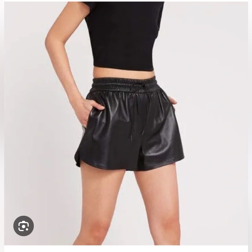 Olivaceous black faux leather shorts size small. In perfect condition!